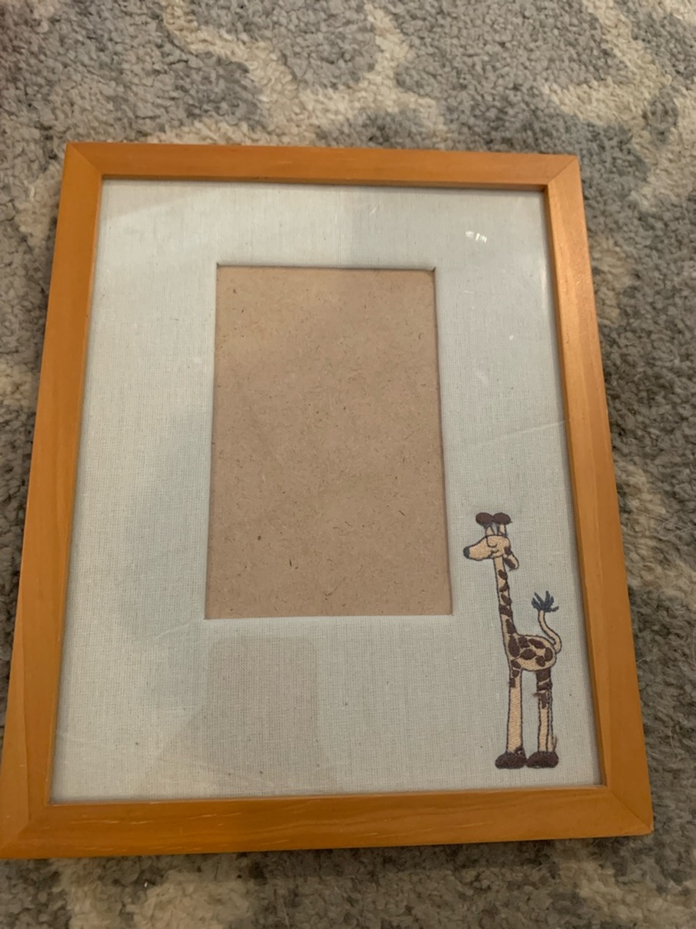 Frame with Playful Giraffe Accent